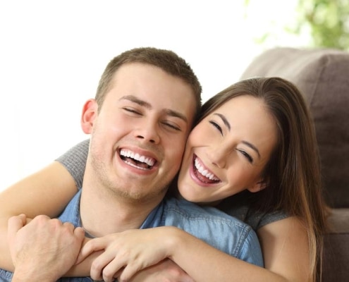 Happy couple with big smiles