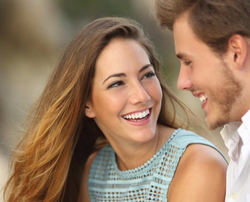 Happy Couple Smiling At Each Other